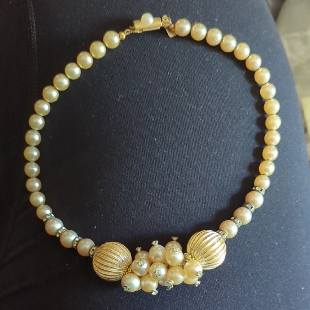 Gold Necklace with Textured Beads and Crystal Accents
